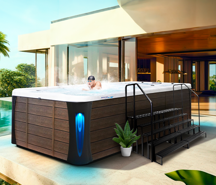 Calspas hot tub being used in a family setting - Palmbeach Gardens